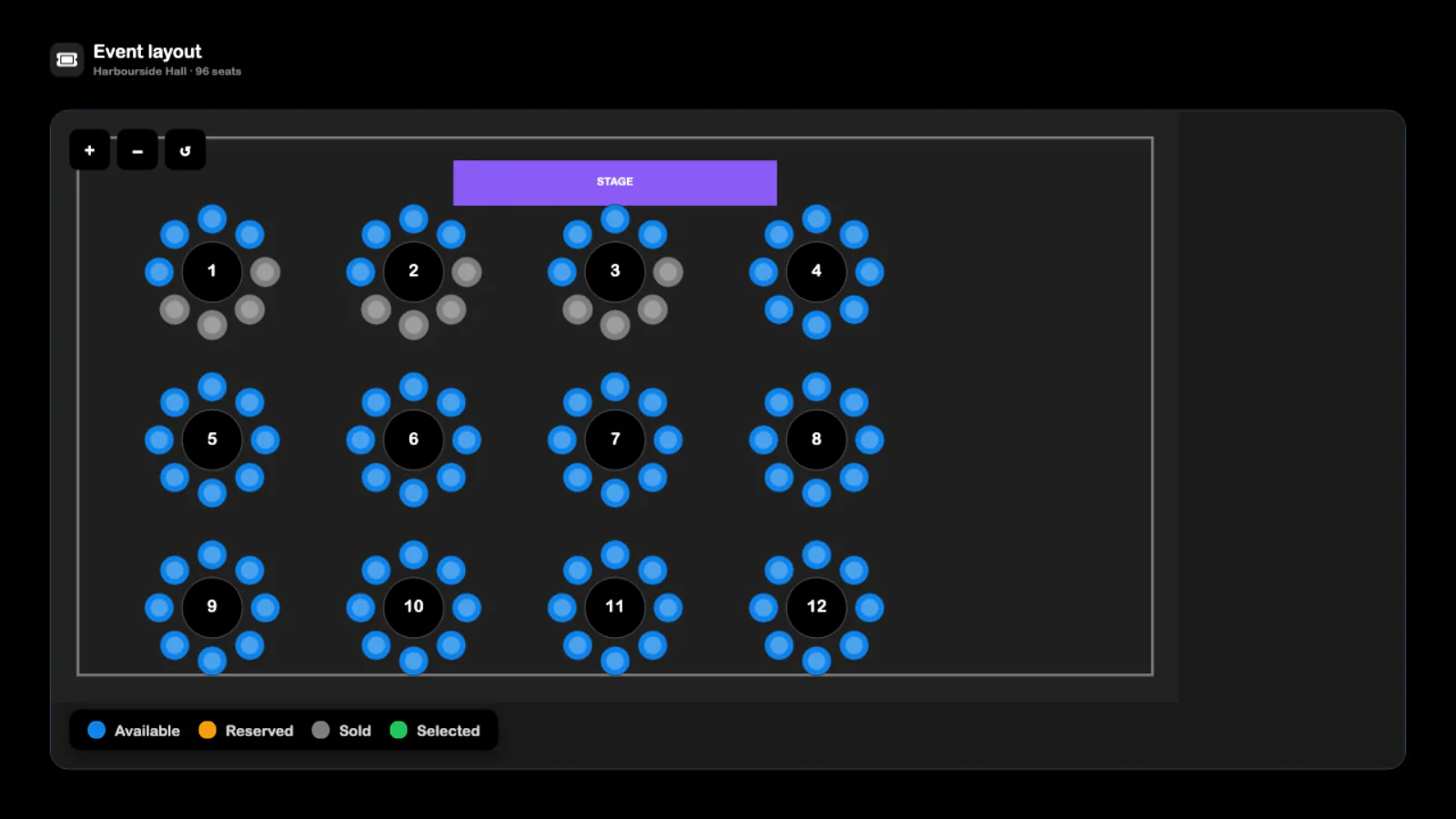 SRVZr event seating layout with twelve tables, numbered seats, and booking availability